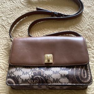 Authentic Michael Kors monogram Crossbody. Includes dust bag